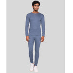 Man wearing a SILKCUT UNDERWEAR THERMAL SET IN BLUE  set on a light gray background outfit on a gray background