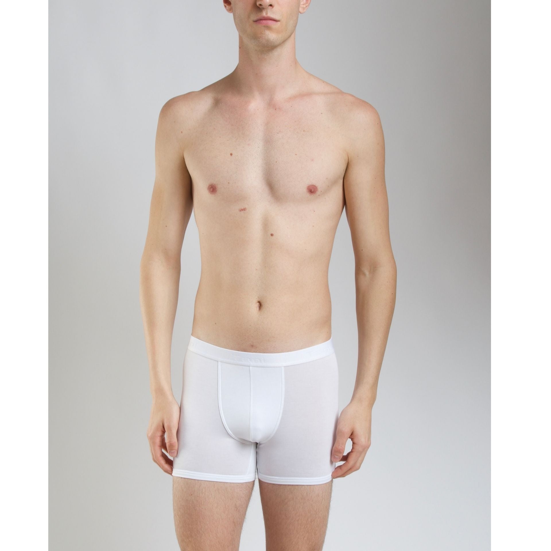 man in micro modal air boxer briefs in white facing front 