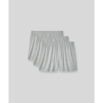 SilkCut men’s boxers displayed with travel essentials flat lay