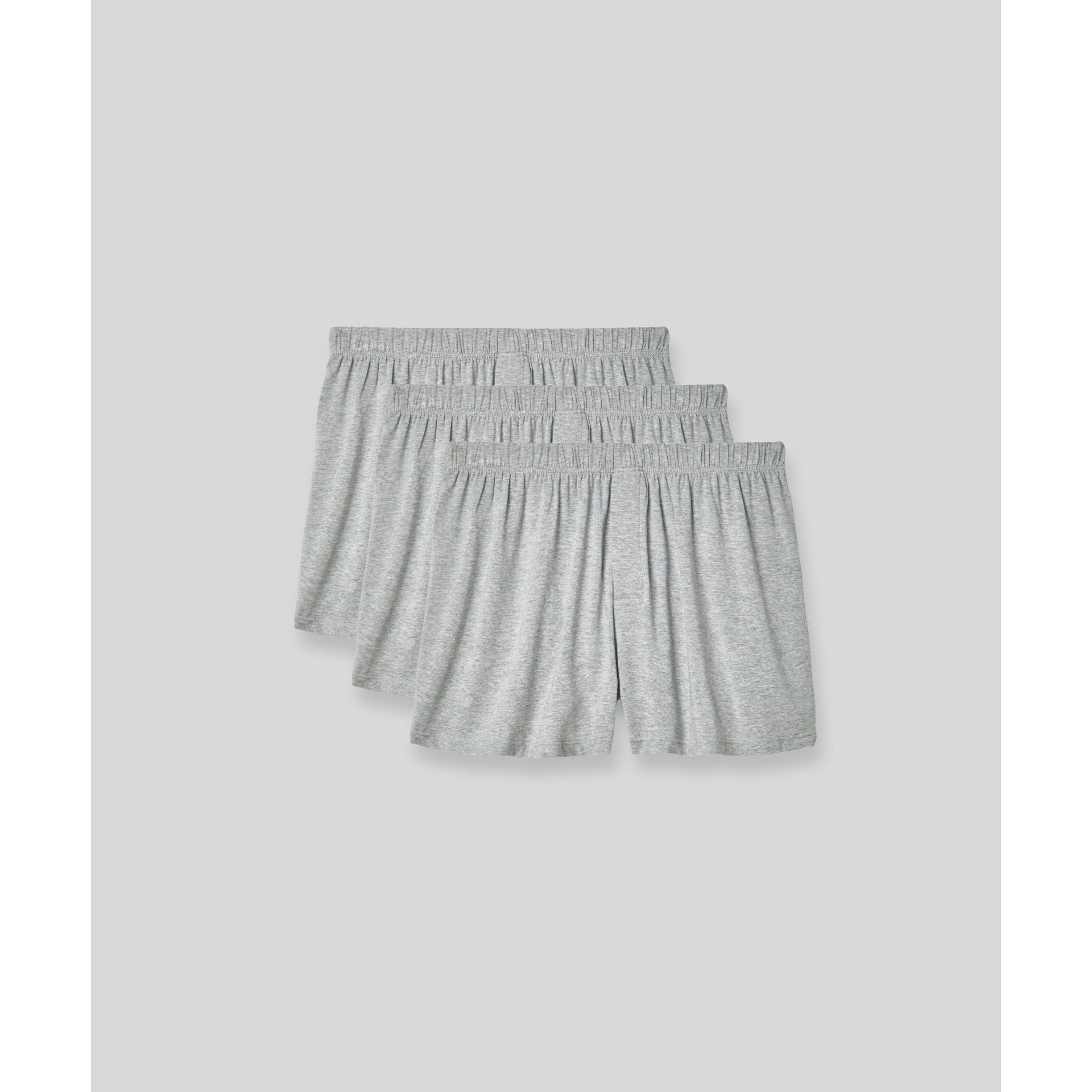 SilkCut men’s boxers displayed with travel essentials flat lay