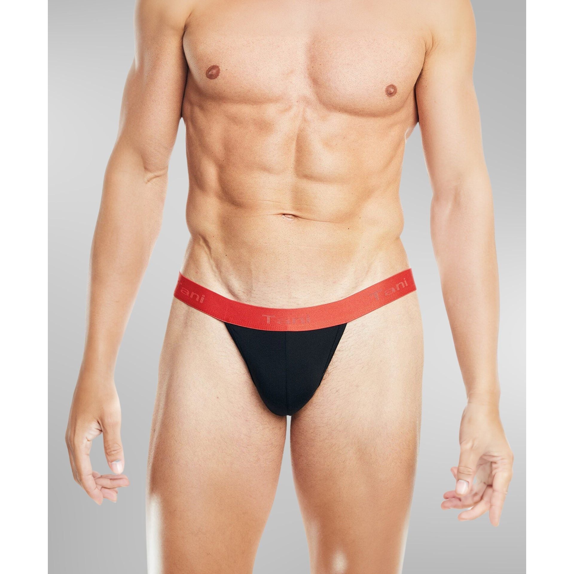 Front view of model wearing SilkCut Micro Modal Jockstrap with red waistband