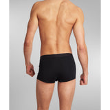Man relaxing at home wearing SilkCut Sea Island Cotton Trunks – effortless everyday comfort