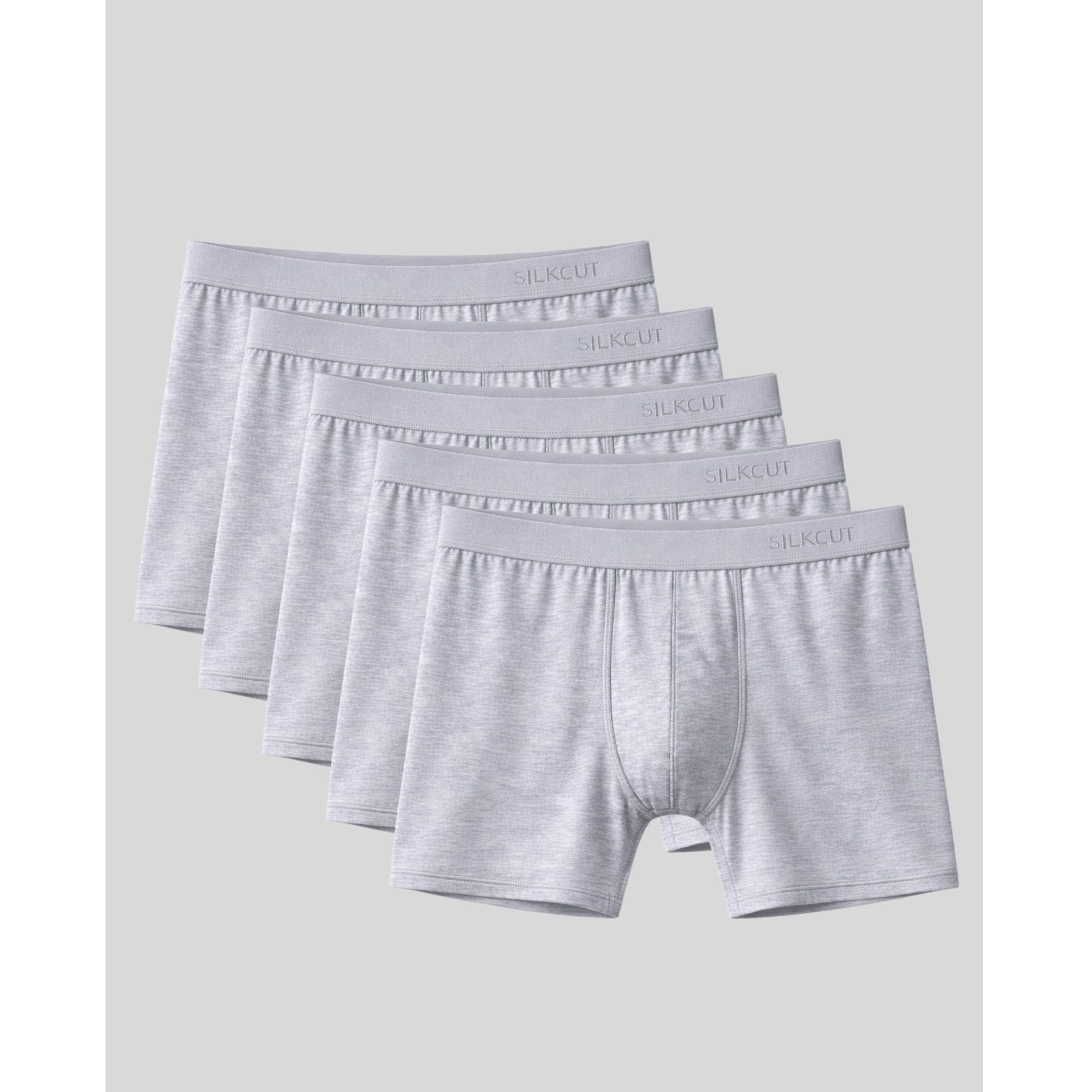 Set of four gray boxer briefs on a light gray background