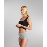 Side view of a woman wearing SilkCut Panties 
