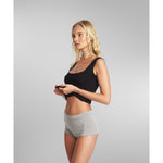 Side view of a woman wearing SilkCut Panties 